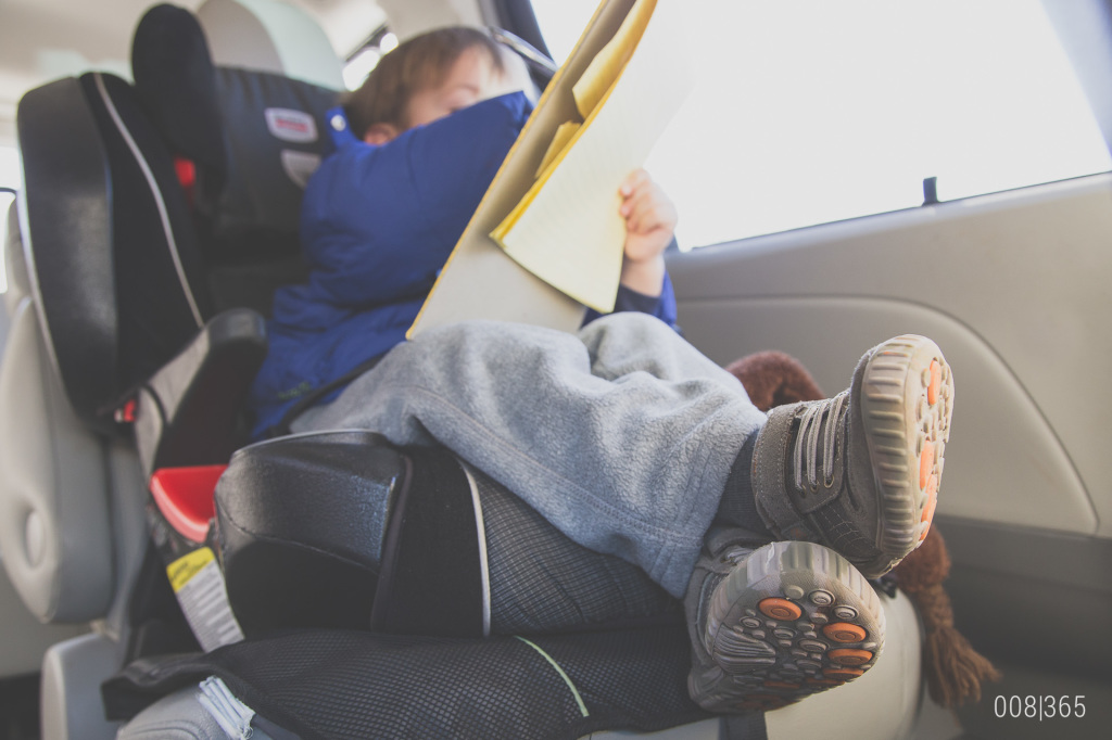frigid temps means long carpool lines.  thank goodness for this little guy with a big imagination.  