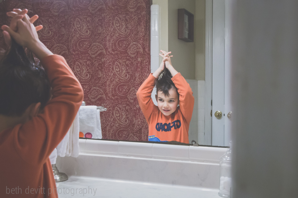 every night after the boys shower they love to see how silly they can make their hair look before it dries.  it's the simple things in life.  