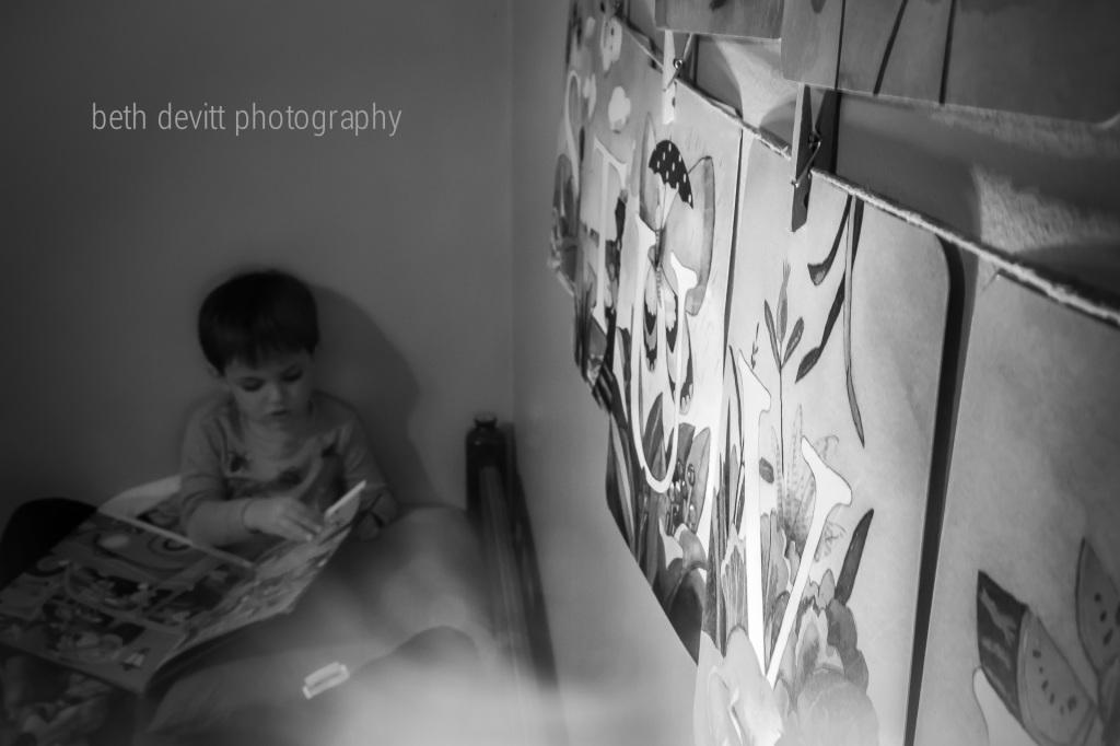 usually i get to snuggle here with both boys and the dog for story time before bed, but tonight it was just me and this little one!  {i learned the valuable lesson to not wait until the last minute of the day to snap my shot of the day today as well}.  ;)