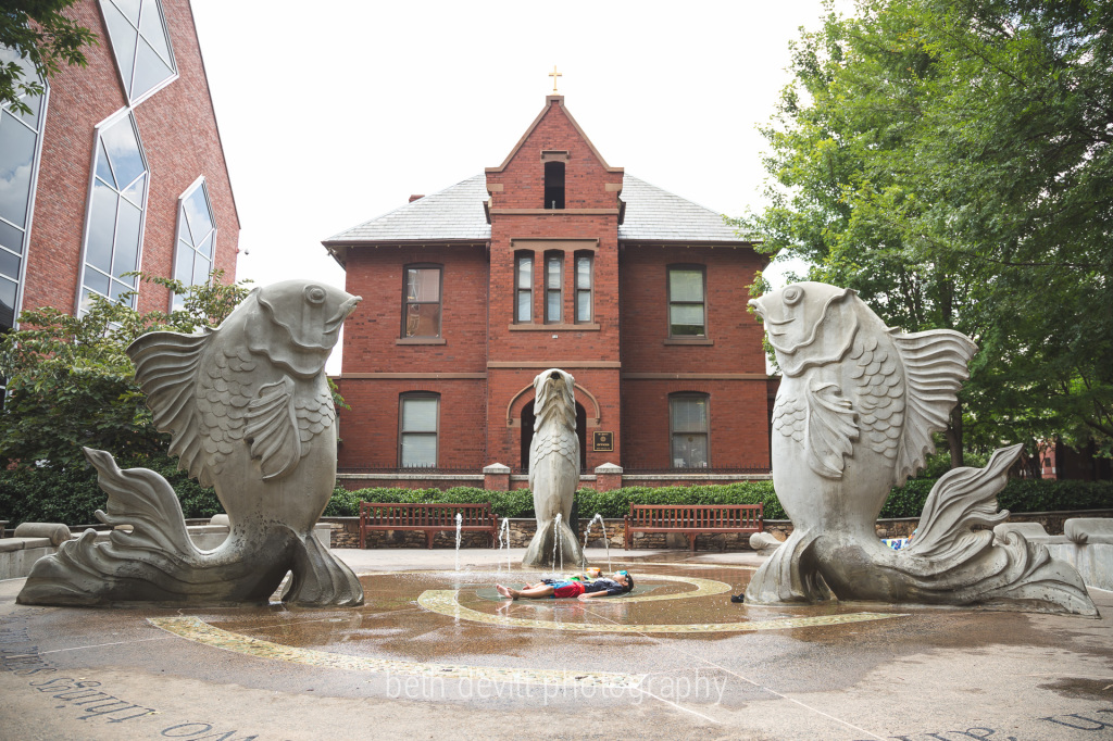 when you can lie flat on the ground - goggles and swim gear on - in the middle of a fish fountain in the middle of uptown charlotte, you lead a carefree life.  ;)