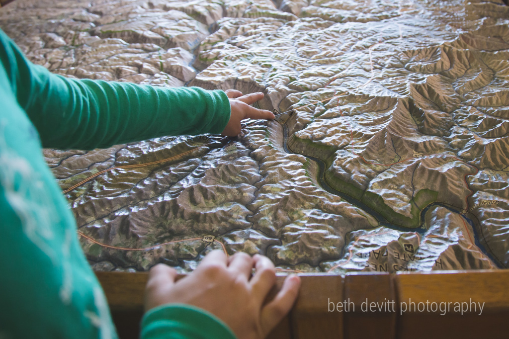 on our way home, we stopped to stretch our legs at the 'new river gorge' scenic overlook.  the boys loved the topographical map that detailed the bridge we drive over. 