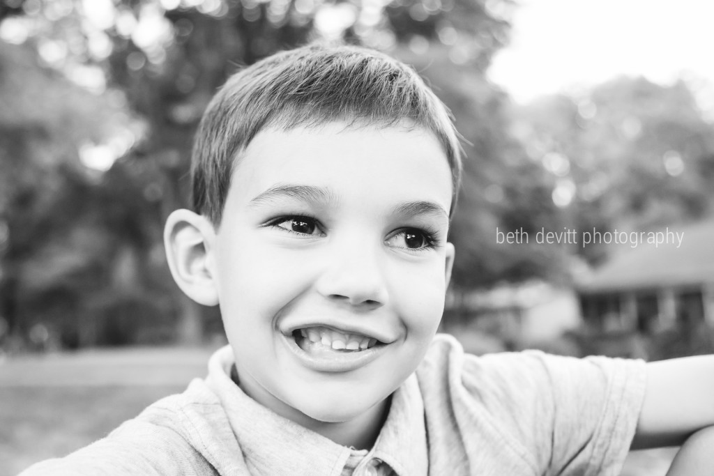 i had a more technically correct photo chosen for today’s image, but i kept coming back to this one. tonight was open house for first grade. once we got home, i wanted to snap a picture of this guy to document the occasion, but he was so pumped up that it was tough. i love the happiness that i see in his eyes in this image. his sideways smile just oozes excitement. there is so much goodness in store for him this year. i loved seeing him connect with old friends and meet his new teacher. he loves school, and i love him. i think first grade is going to be his year. 