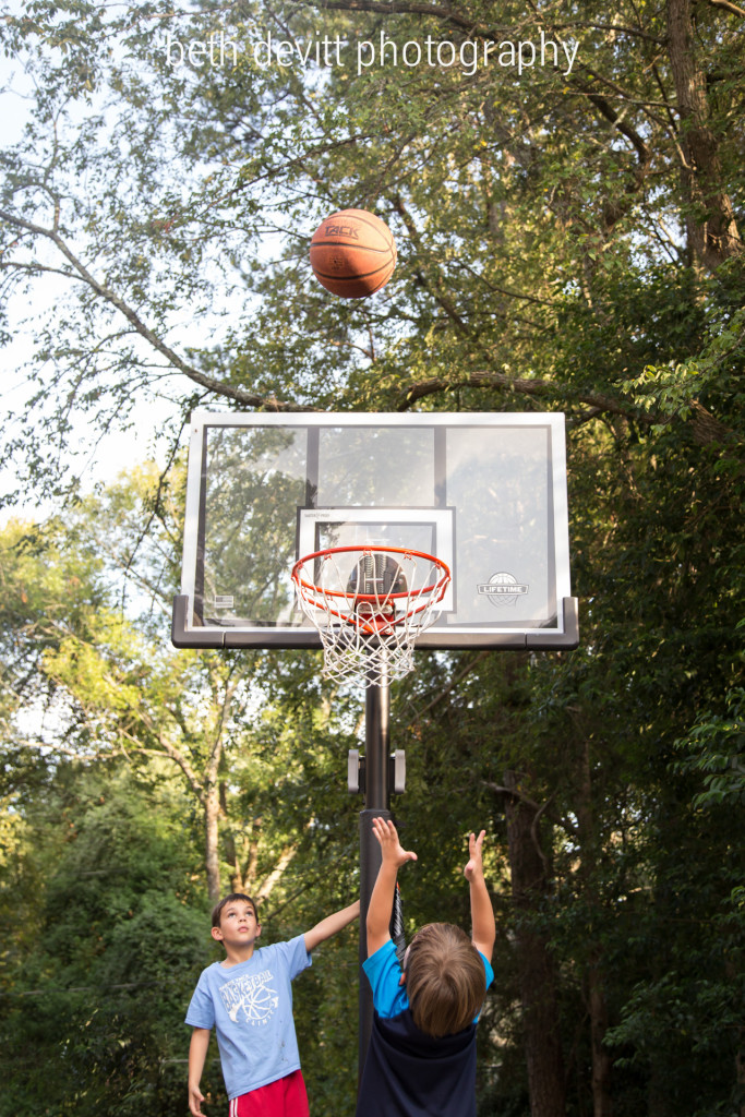 so, the littlest made a basket in the big boy hoop yesterday.  he is completely hooked, and his daddy is completely overjoyed.  