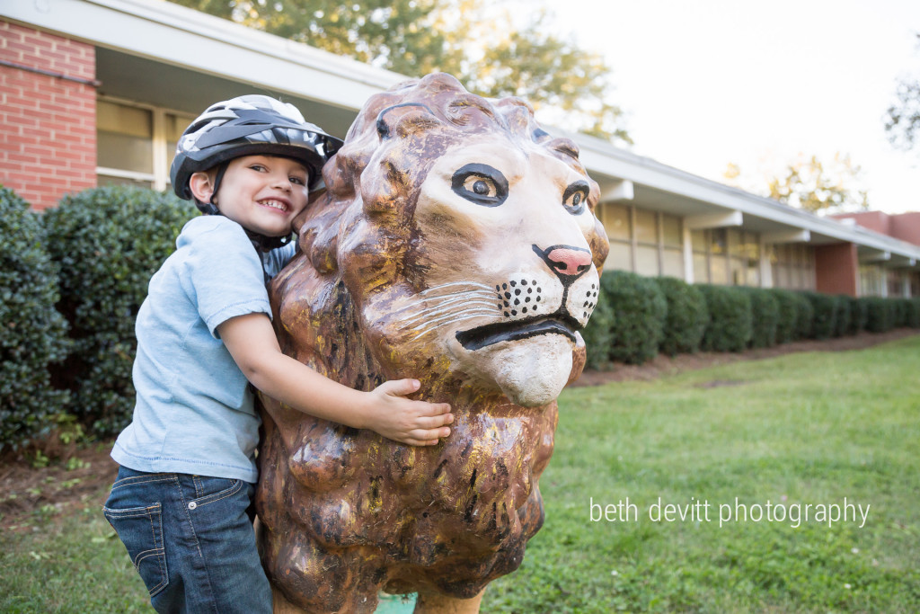 a sweet boy, a lion and that smile - oh my!