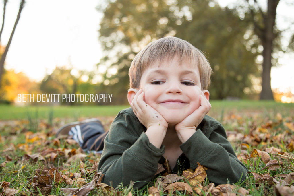 i love this sweet boy right to the tippy top.  {and, we need to add raking our leaves to our weekend task list}.  